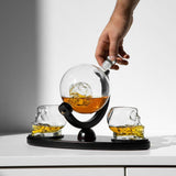 Don Vassie skull decanter set with 2 glasses and mahogany base