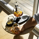 Don Vassie skull decanter set with 2 glasses and mahogany base
