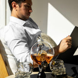 Don Vassie skull decanter set with 2 glasses and mahogany base