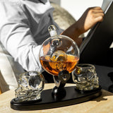 Don Vassie skull decanter set with 2 glasses and mahogany base