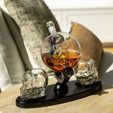 Don Vassie skull decanter set with 2 glasses and mahogany base