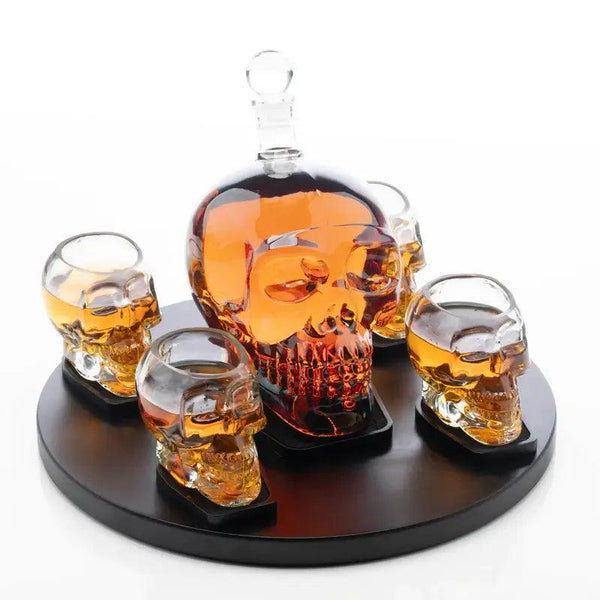 Don Vassie Skull Decanter Set with 4 Shot Skull Glasses and Round Wooden Base
