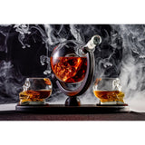 Don Vassie skull decanter set with 2 glasses and mahogany base