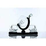 Don Vassie skull decanter set with 2 glasses and mahogany base